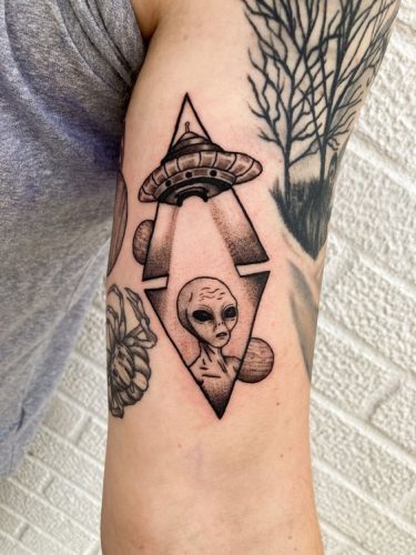 Explore the Cosmos with Style: 20 Stunning Alien Tattoo Ideas to Inspire Your Next Ink Adventure in