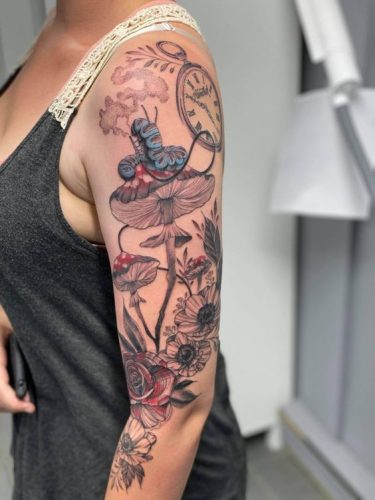 Immerse in the Magic: 15 Alice in Wonderland Tattoo Sleeves for