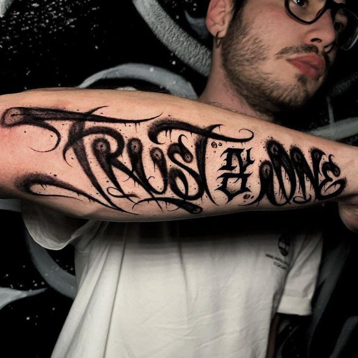 25 Trust No One Tattoo Designs with Lettering, Fonts, Ideas for Men and Women